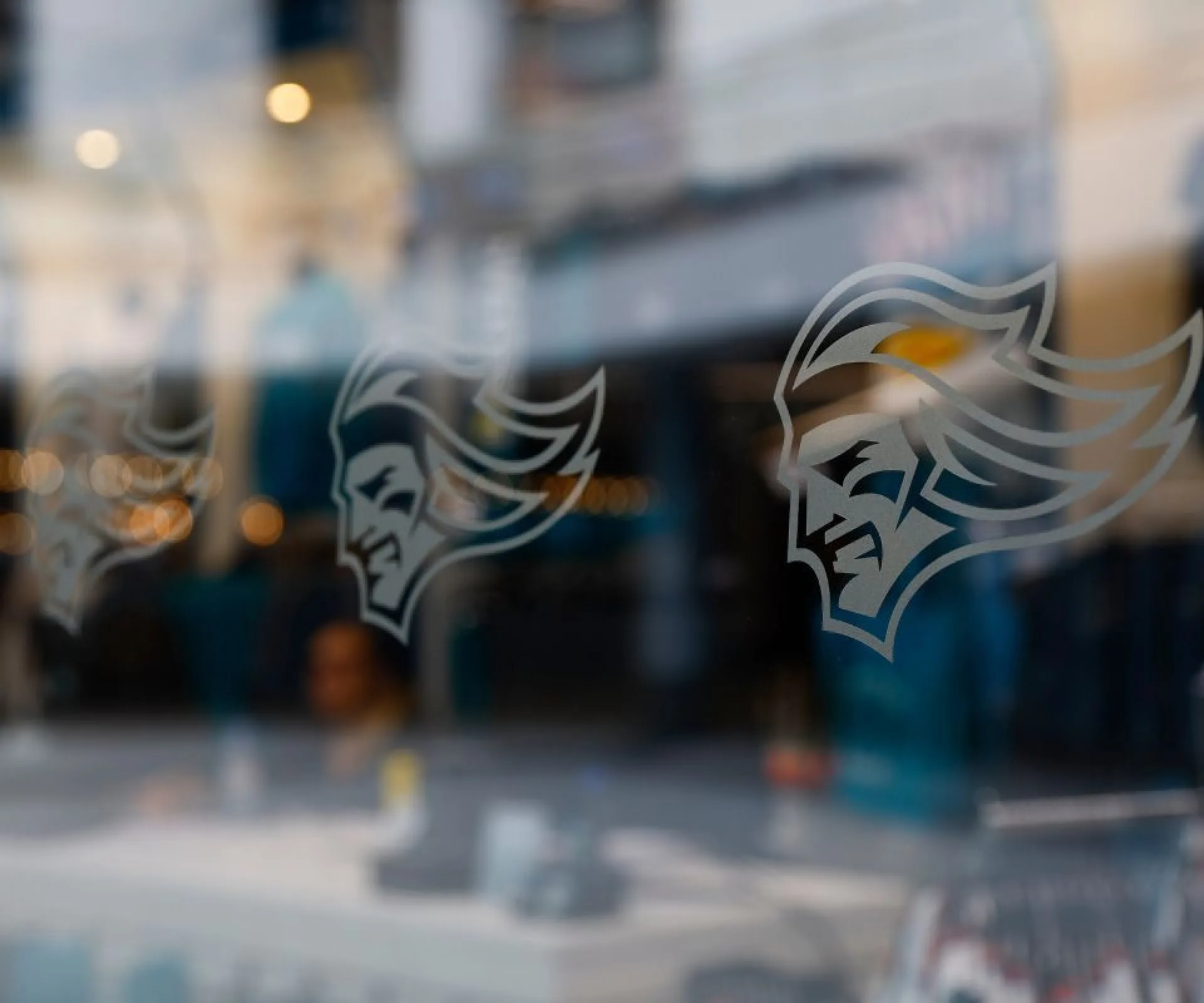 A photograph of the windows at Belfast Giants Official Store in Odyssey Place