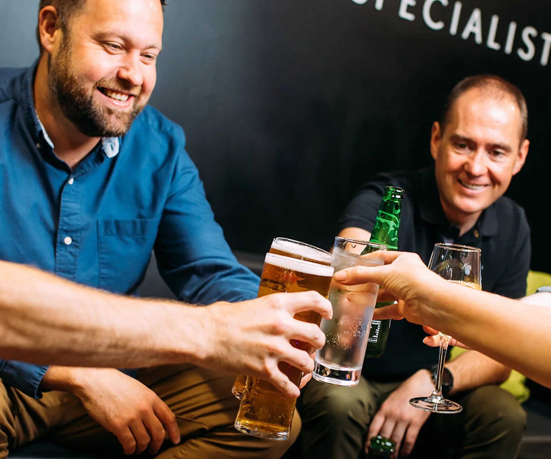 Group of people sitting with drinks
