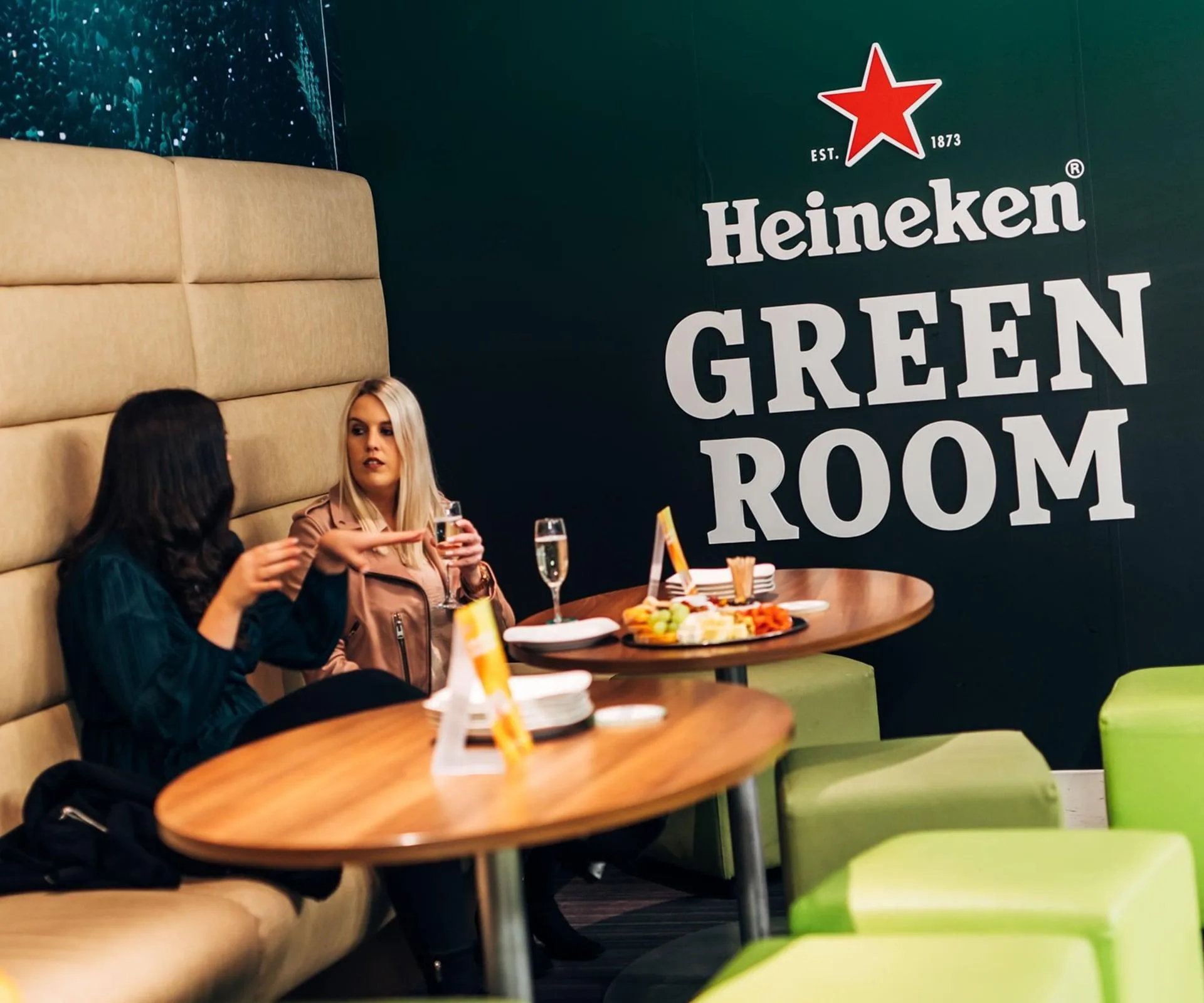 Heineken green room two people enjoying
