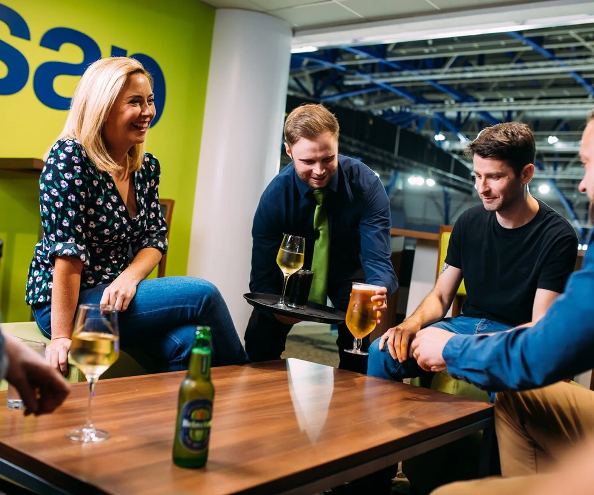 People enjoying refreshments in sse arena suites