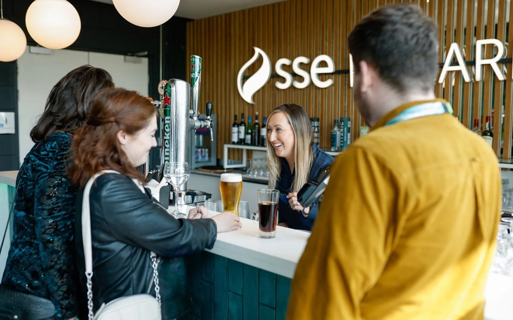 Customers enjoying sse reward lounge