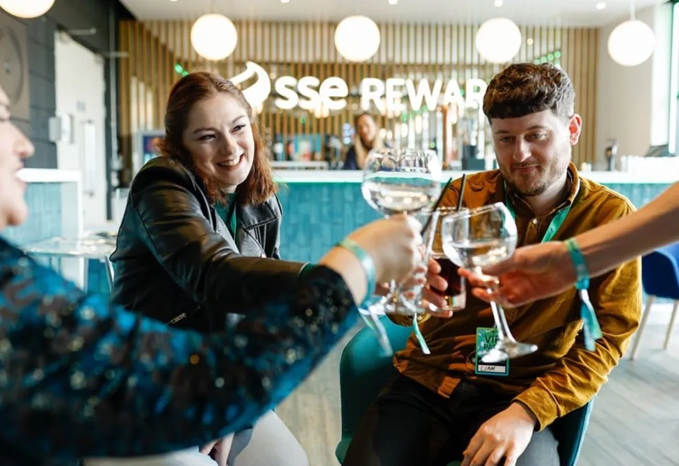 Sse reward lounge people enjoying drinks